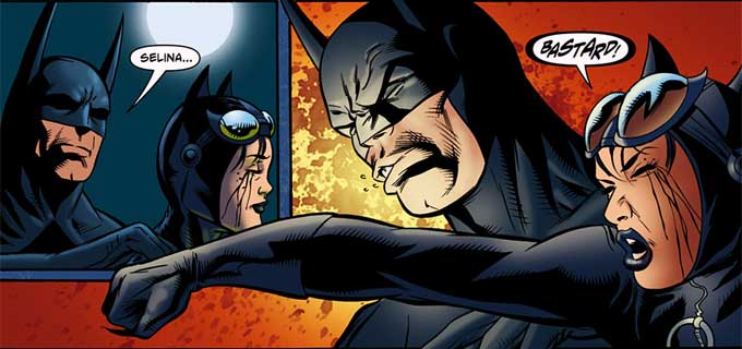 Catwoman punches Batman in face