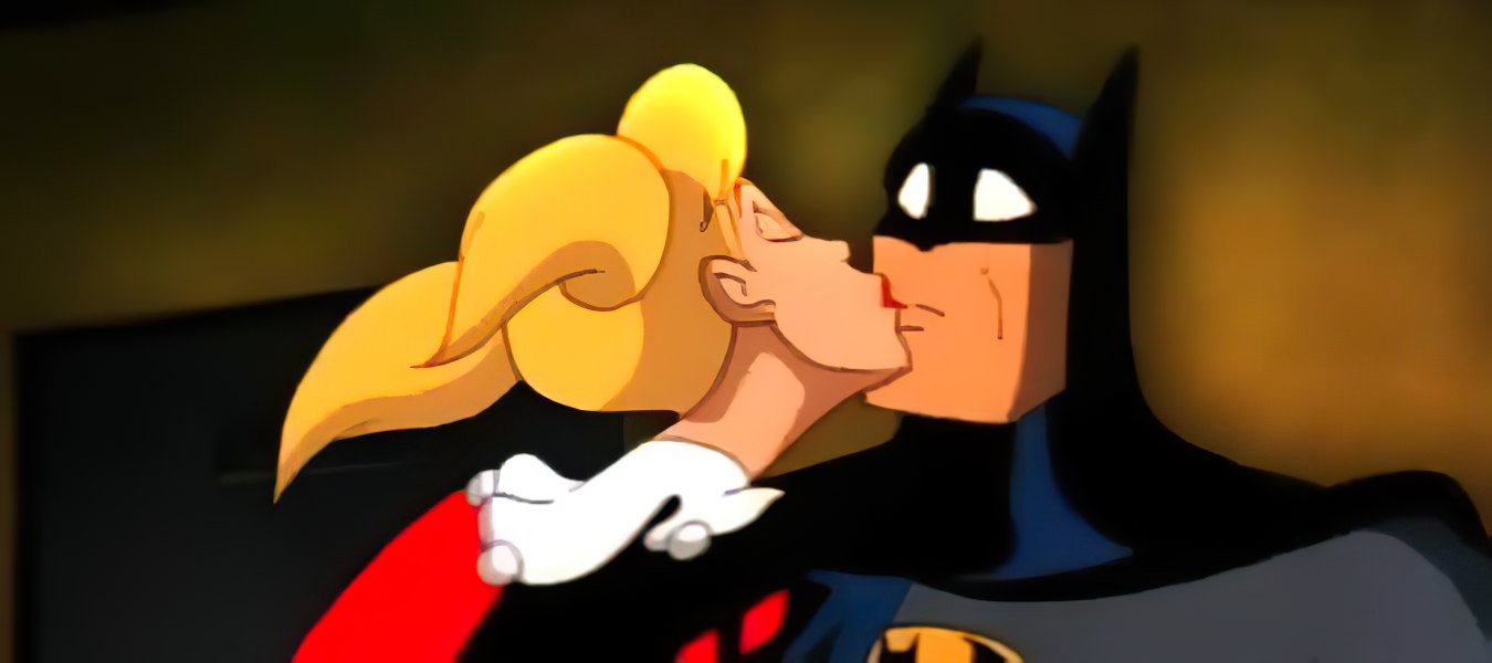 http://www.orgamesmic.com/wp-content/uploads/2013/06/harley-quinn-kisses-batman.jpg